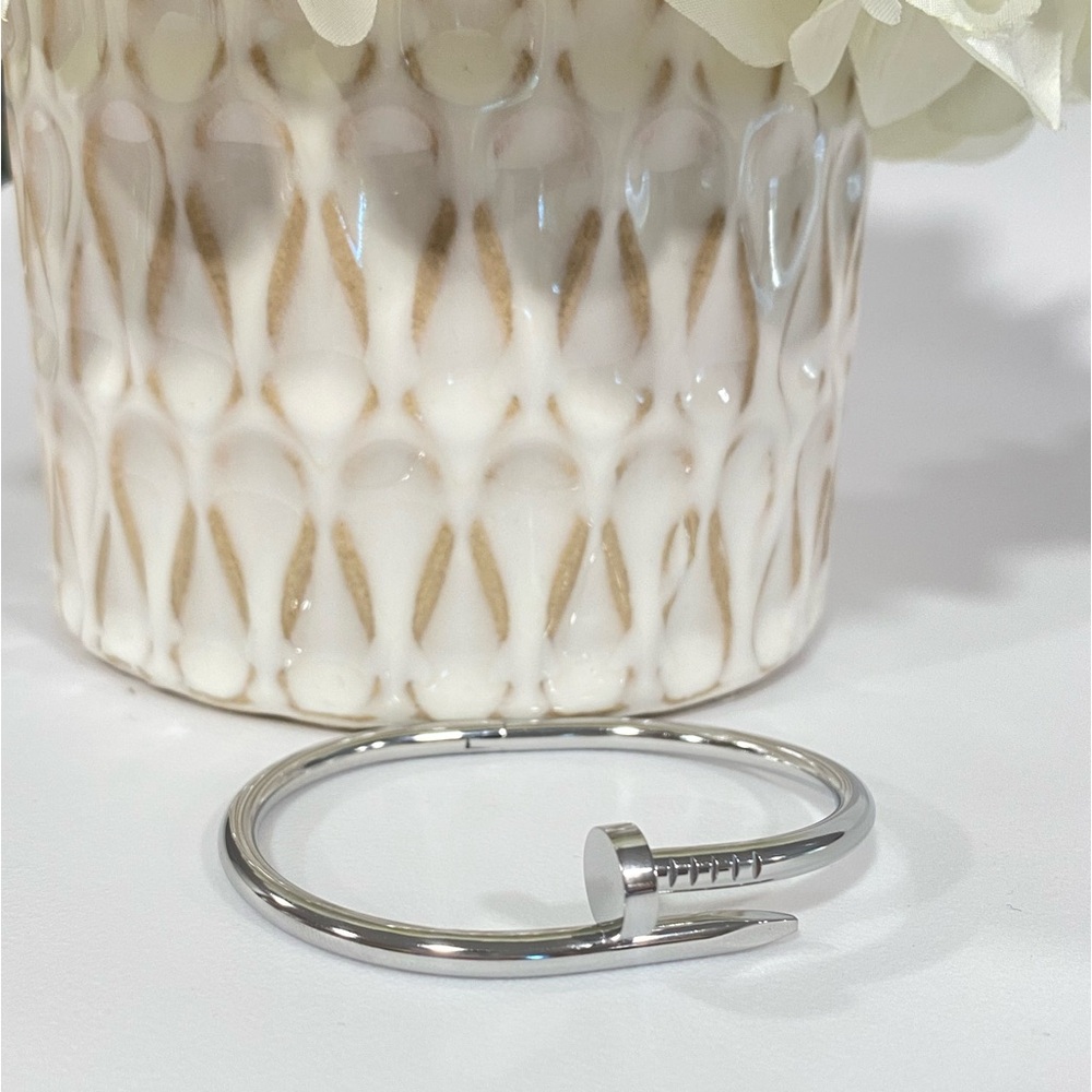 308. Stainless Steel Nail shaped Cuff Bracelet in silver tone